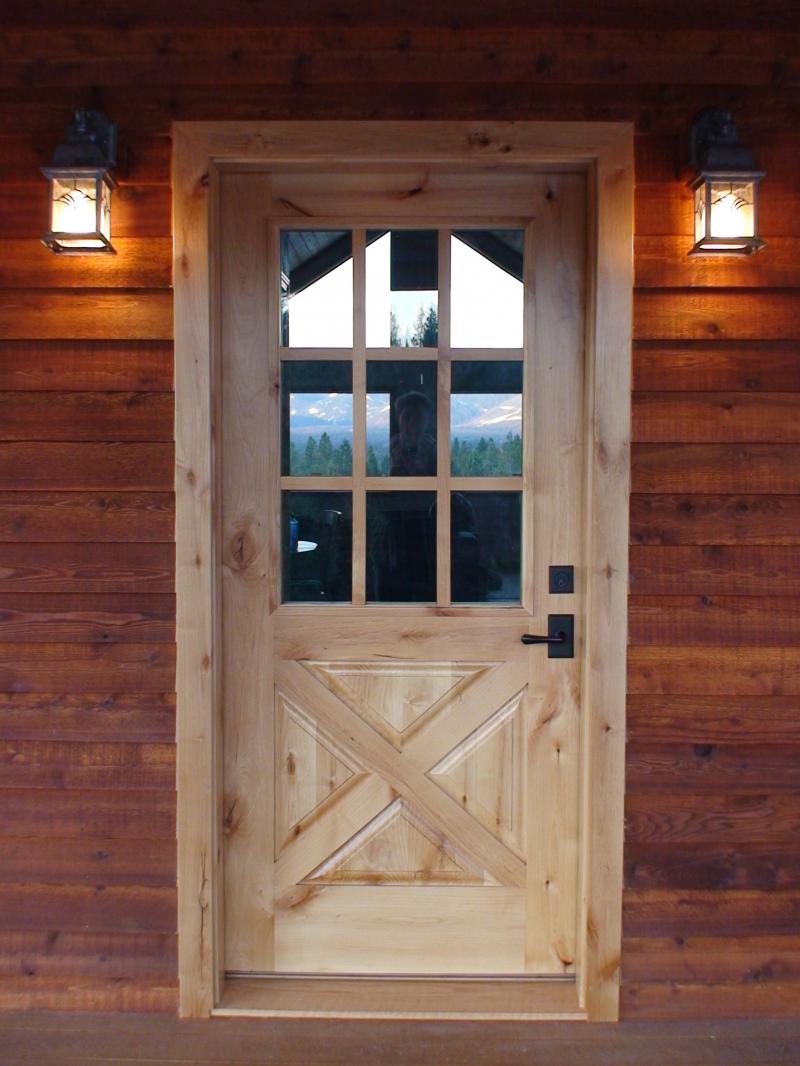 nine light door with "x" design and raised panels